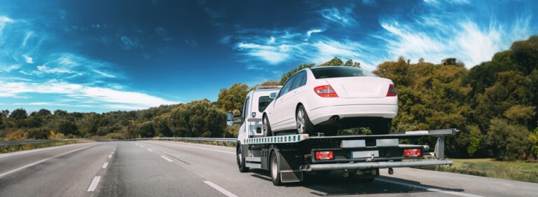 Car Service Transportation Concept. Tow Truck Transporting Car Or Help On Road Transports Wrecker Broken Car. Auto Towing, Tow Truck For Transportation Faults And Emergency Cars 